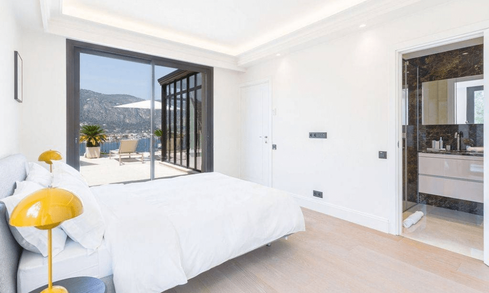 Bright living room interior with panoramic sea views